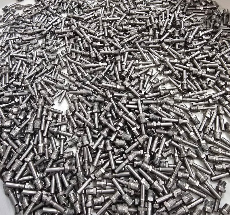 Production run of Swiss-turned titanium heatbreaks